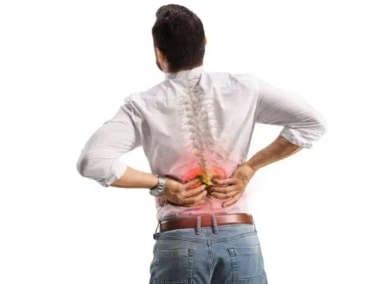 A man holding his lower back, with a highlighted red area and a spine illustration indicating lower back pain.