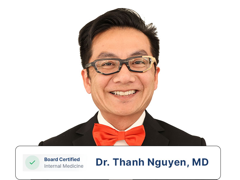 Smiling man wearing glasses, a black suit, and a red bow tie; text identifies him as Dr. Thanh Nguyen, MD, Board Certified in Internal Medicine.